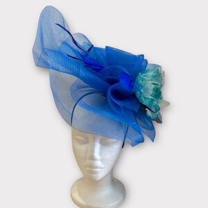 New blue turquoise  fascinator with flower  accents Fast shipping